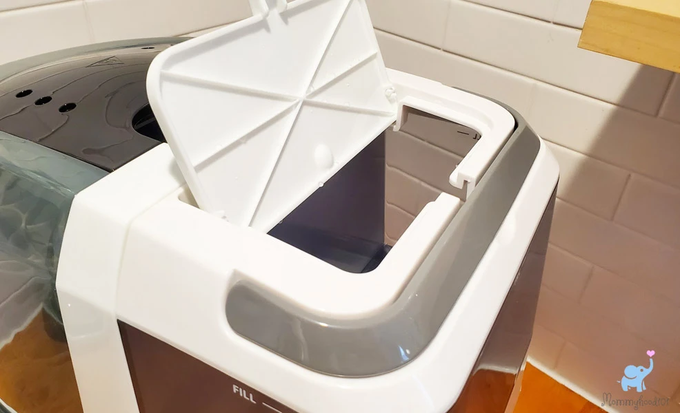 filling the baby brezza bottle washer pro with water