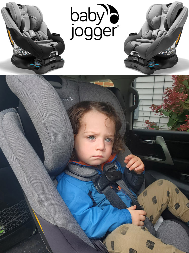 Baby Jogger City Turn toddler boy sitting in the baby jogger city turn car seat