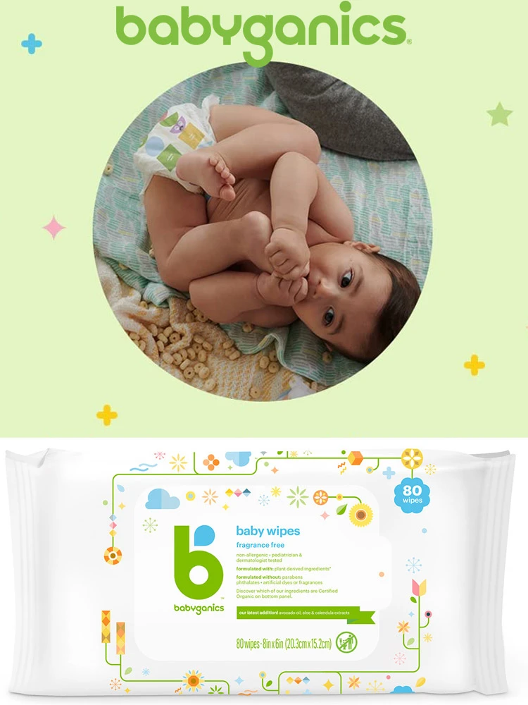 a baby wearing a diaper laying down and a package of babyganics baby wipes