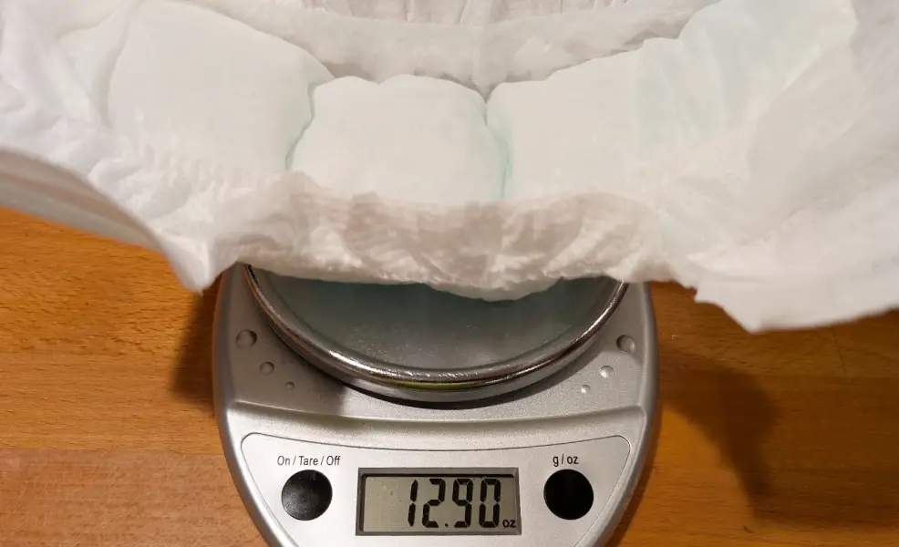 coterie diaper wet weight on scale