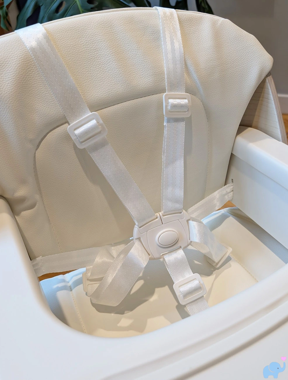 Mamazing GrowPod shoulder harness rerouted behind seat back to improve usability
