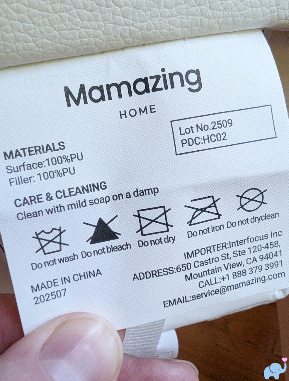 Mamazing GrowPod seat pad label showing polyurethane construction and care instructions