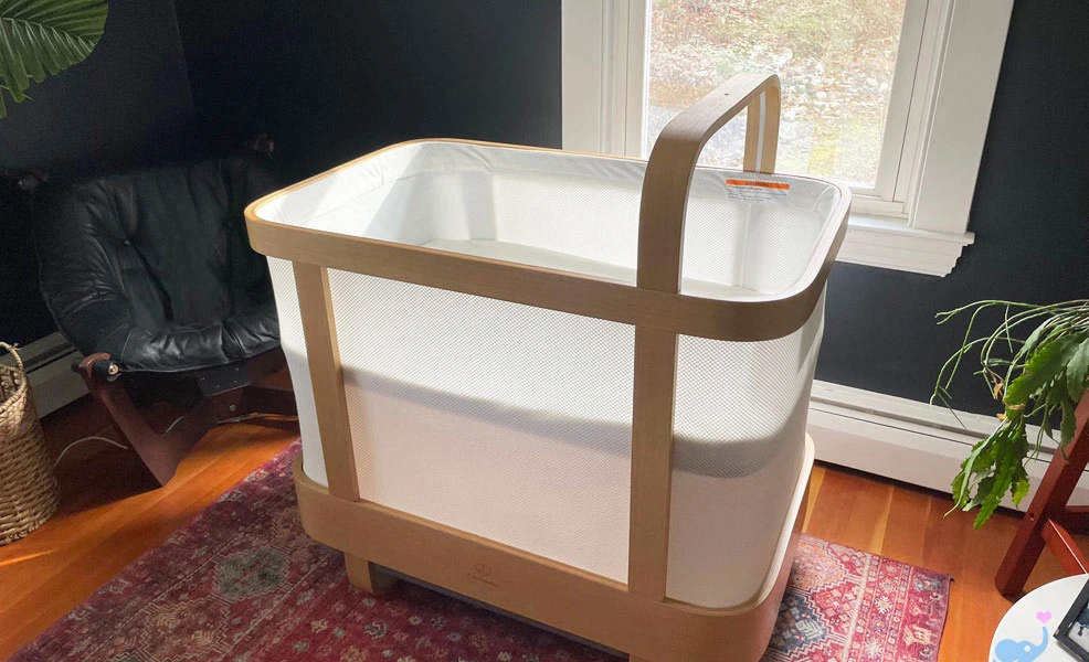 the cradlewise smart crib and bassinet set up in a nursery for testing