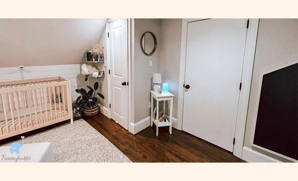 the hatch rest on a table in the corner of a nursery