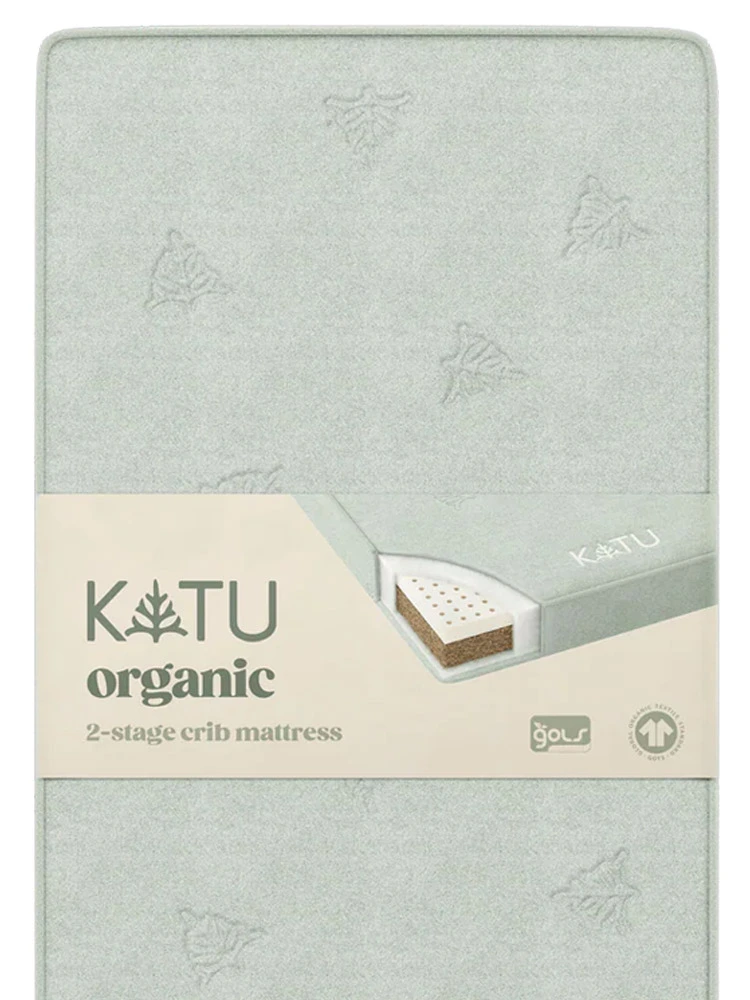 Katu organic crib mattress close up with GOTS and GOLS certifications