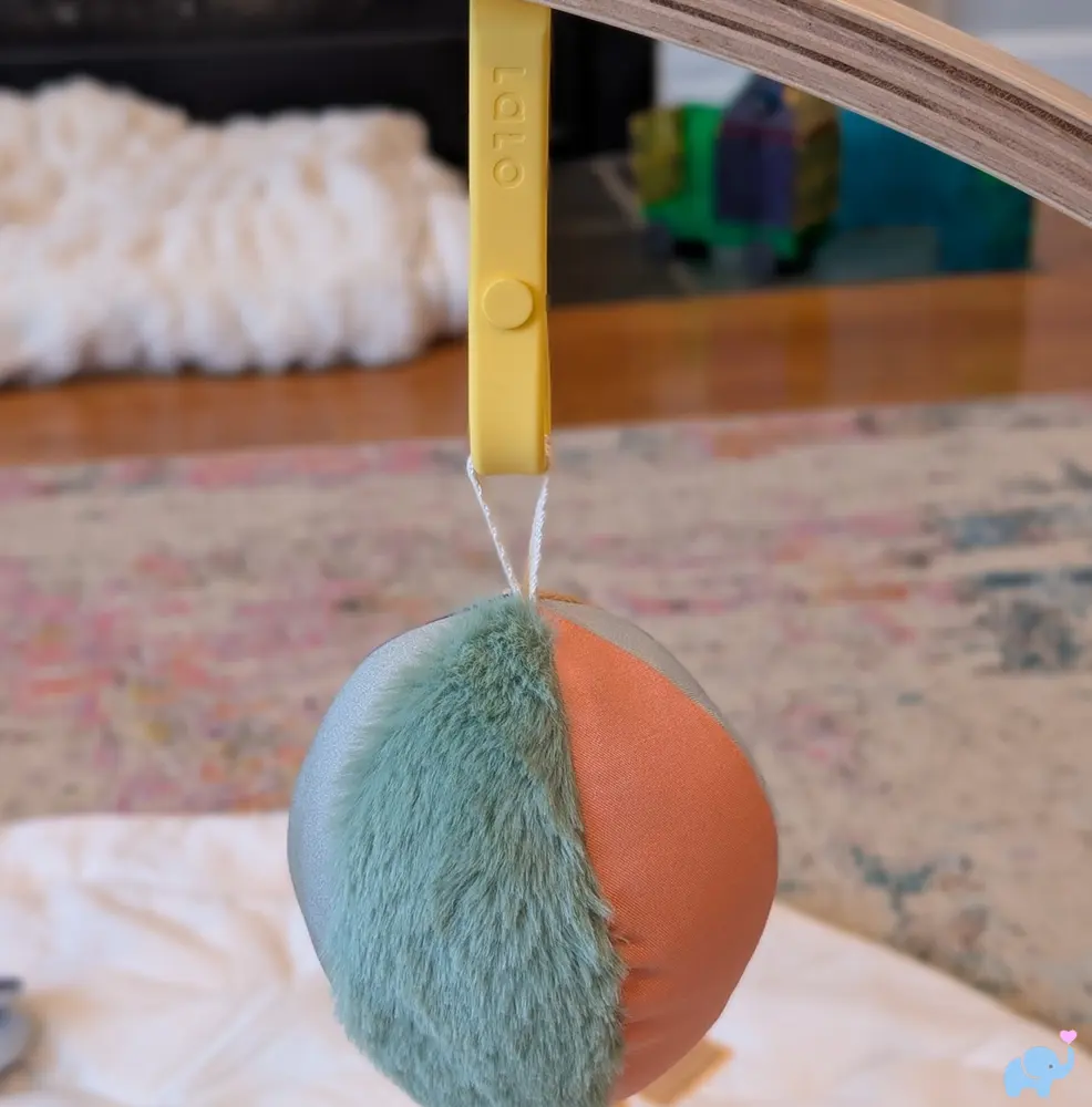 Hanging multi texture squeeze ball on the Lalo Play Gym II