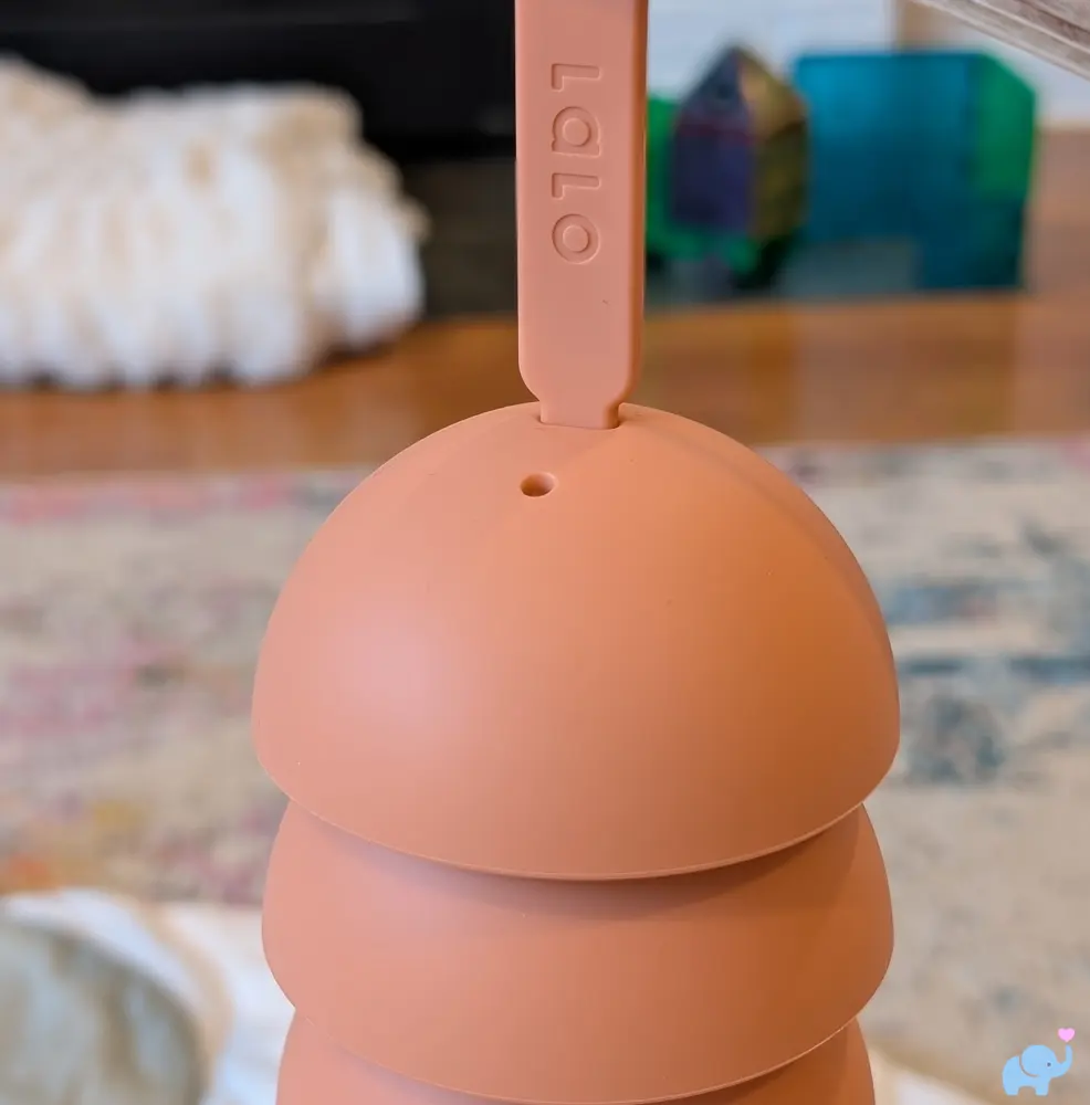 Silicone jingle bells hanging from the Lalo Play Gym II