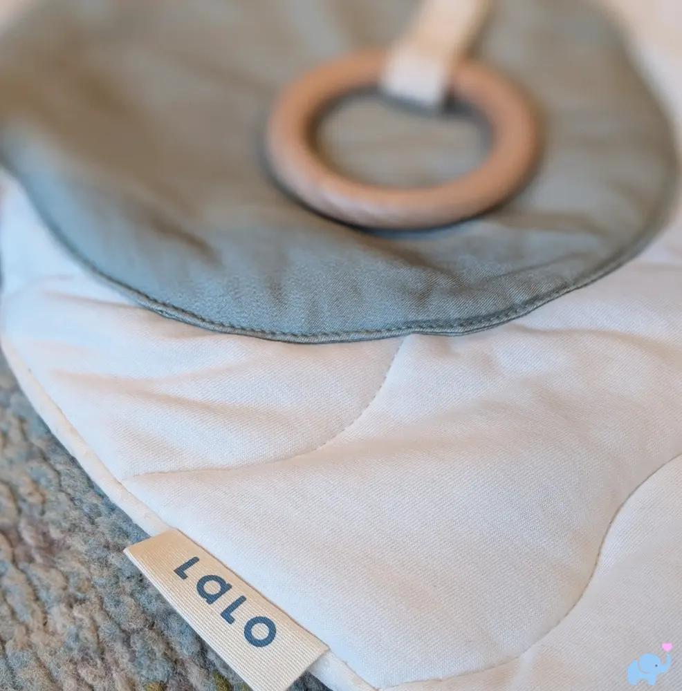 Teething ring hidden in a pocket on the Lalo Play Gym II mat