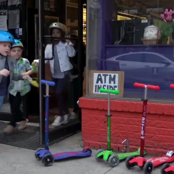 kids riding the adjustable micro maxi folding scooter for preschoolers