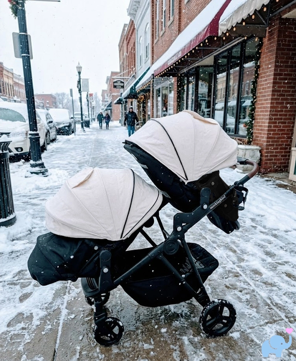 a wintery town showcasing the new legshade foot covers on the mockingbird 3.0 stroller