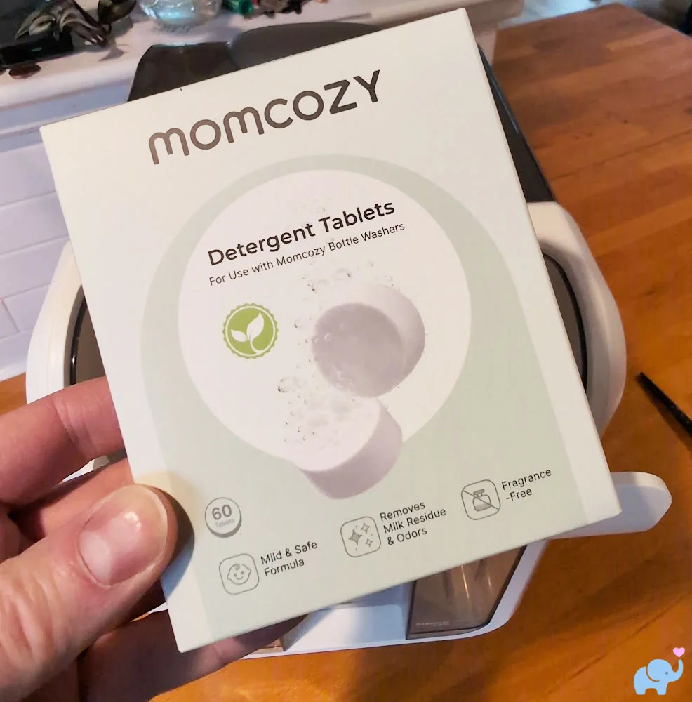 Box of 60 detergent tablets included with the Momcozy DeepClean Baby Bottle Washer D8