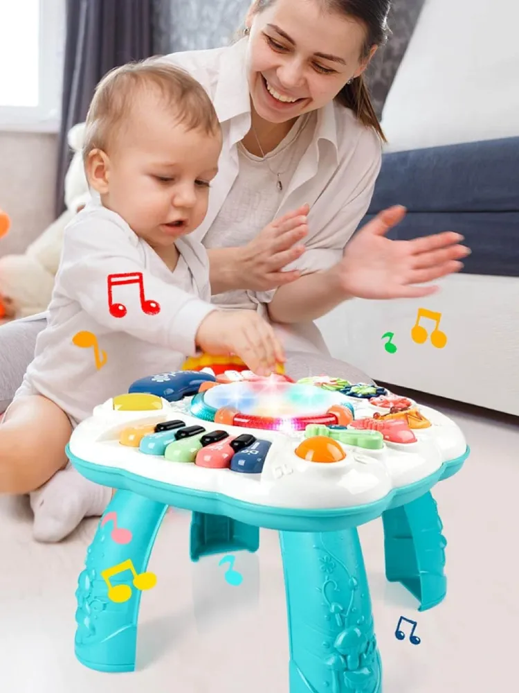 Musical learning activity table for babies with lights and buttons