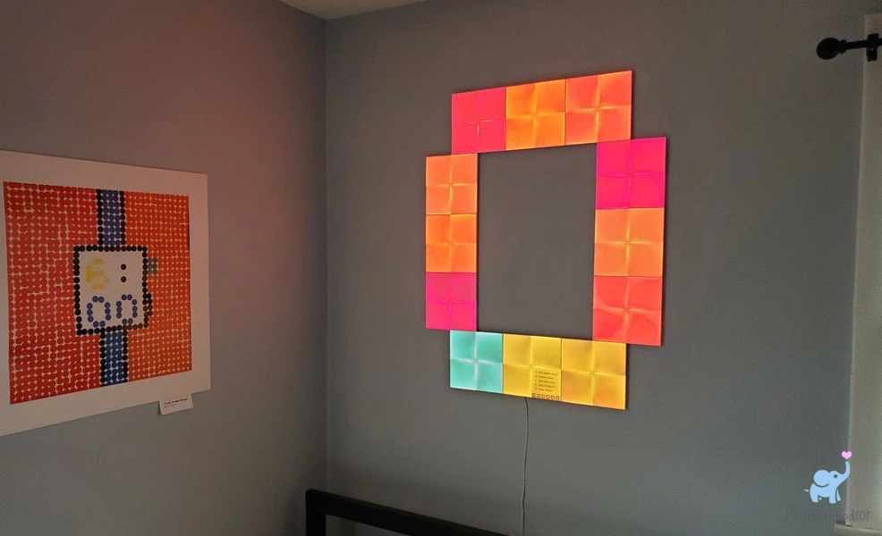 canvas nanoleaf panels installed on wall in letter pattern