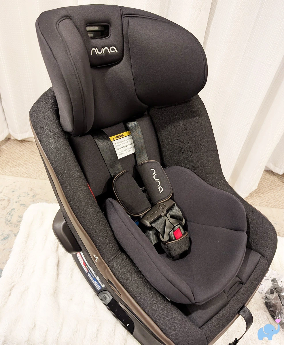 nuna revv maxx headrest fully extended showing 11-position adjustment range