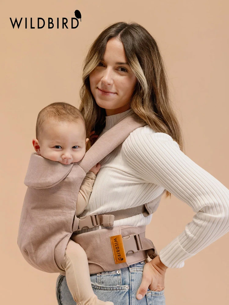 Wildbird Aerial Baby Carrier worn by a mother