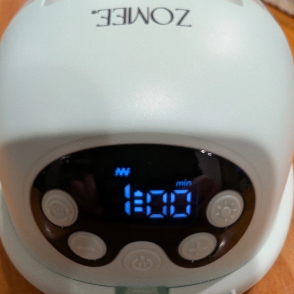 zomee w1 breast pump control panel